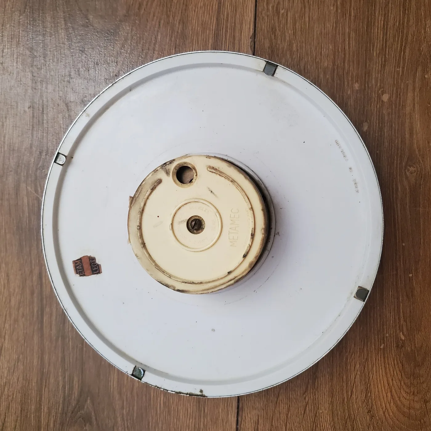 Rear view with the back plate removed, exposing the original movement
